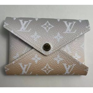 Louis Vuitton Kirigami By the Pool Mini Gray in great used condition.